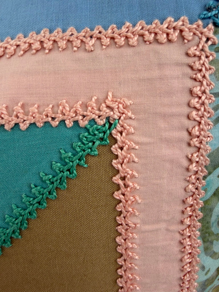 De Colores Design by Pamela Nelson. Hand Embroidered Pillow on red Pamela Nelson