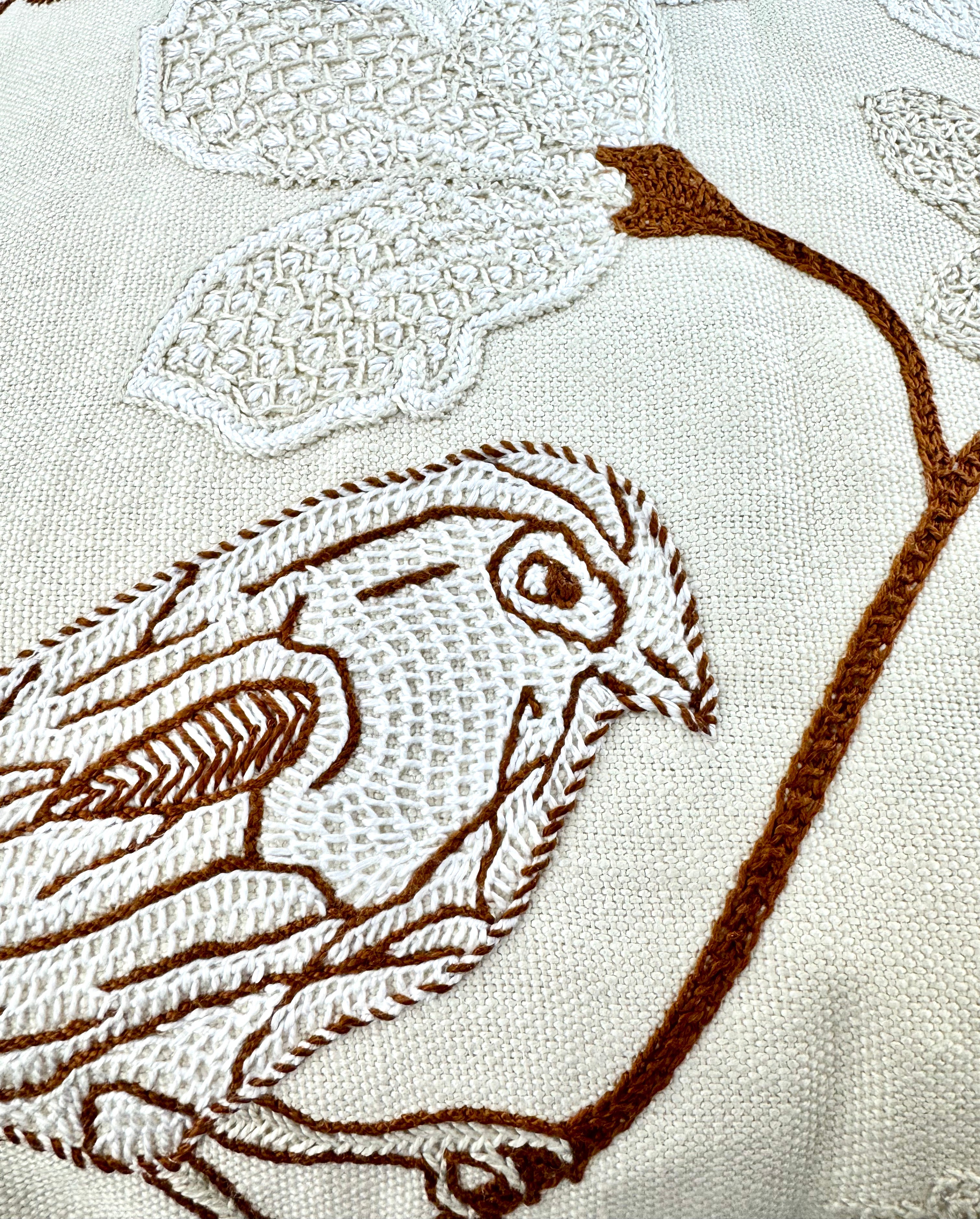 Bird on Dogwood Design by Julie England. Hand Embroidered on white Honduras Threads