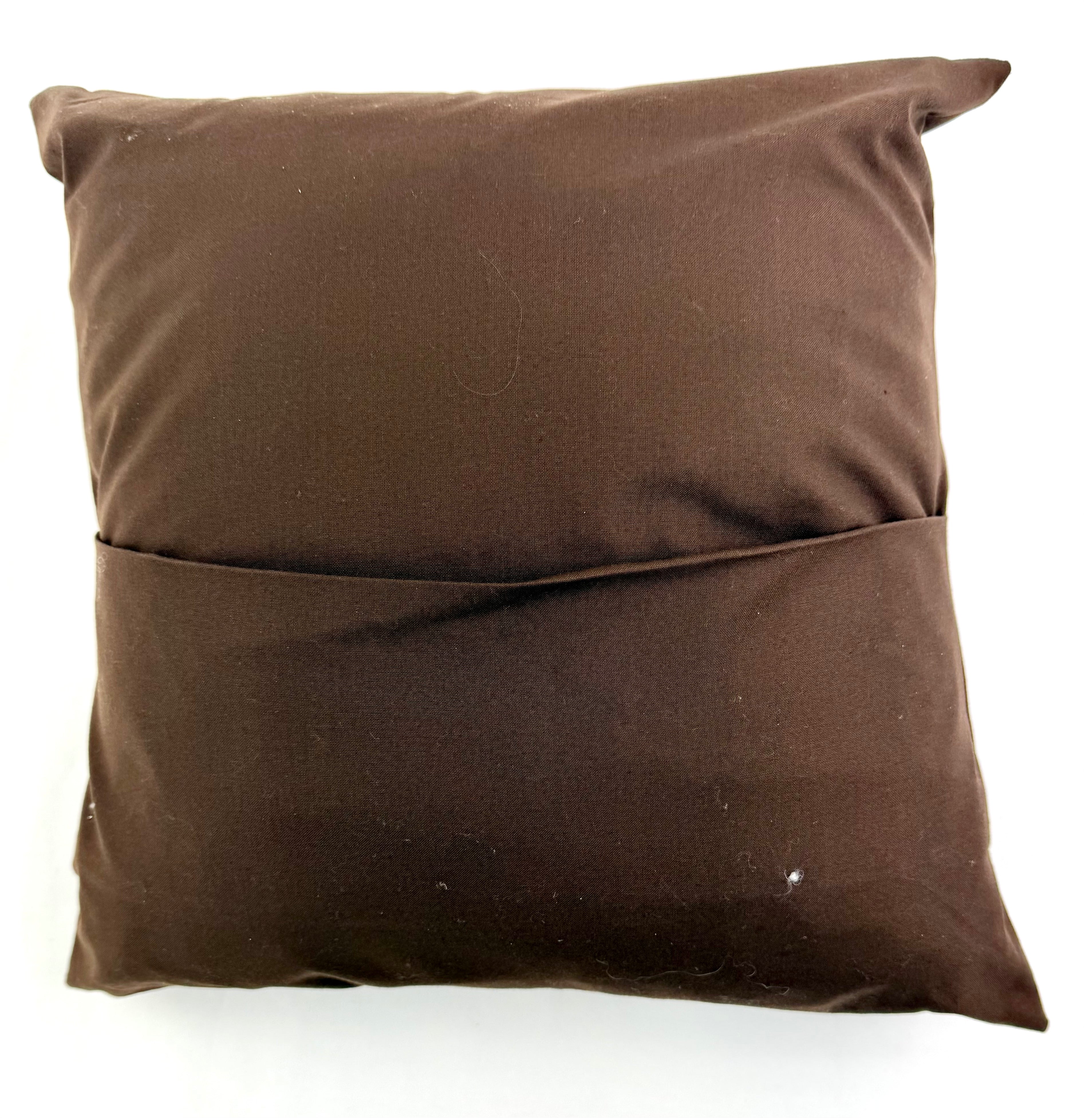 Sol Azul Design by Pamela Nelson. Hand Embroidered Pillow on dark brown Pamela Nelson