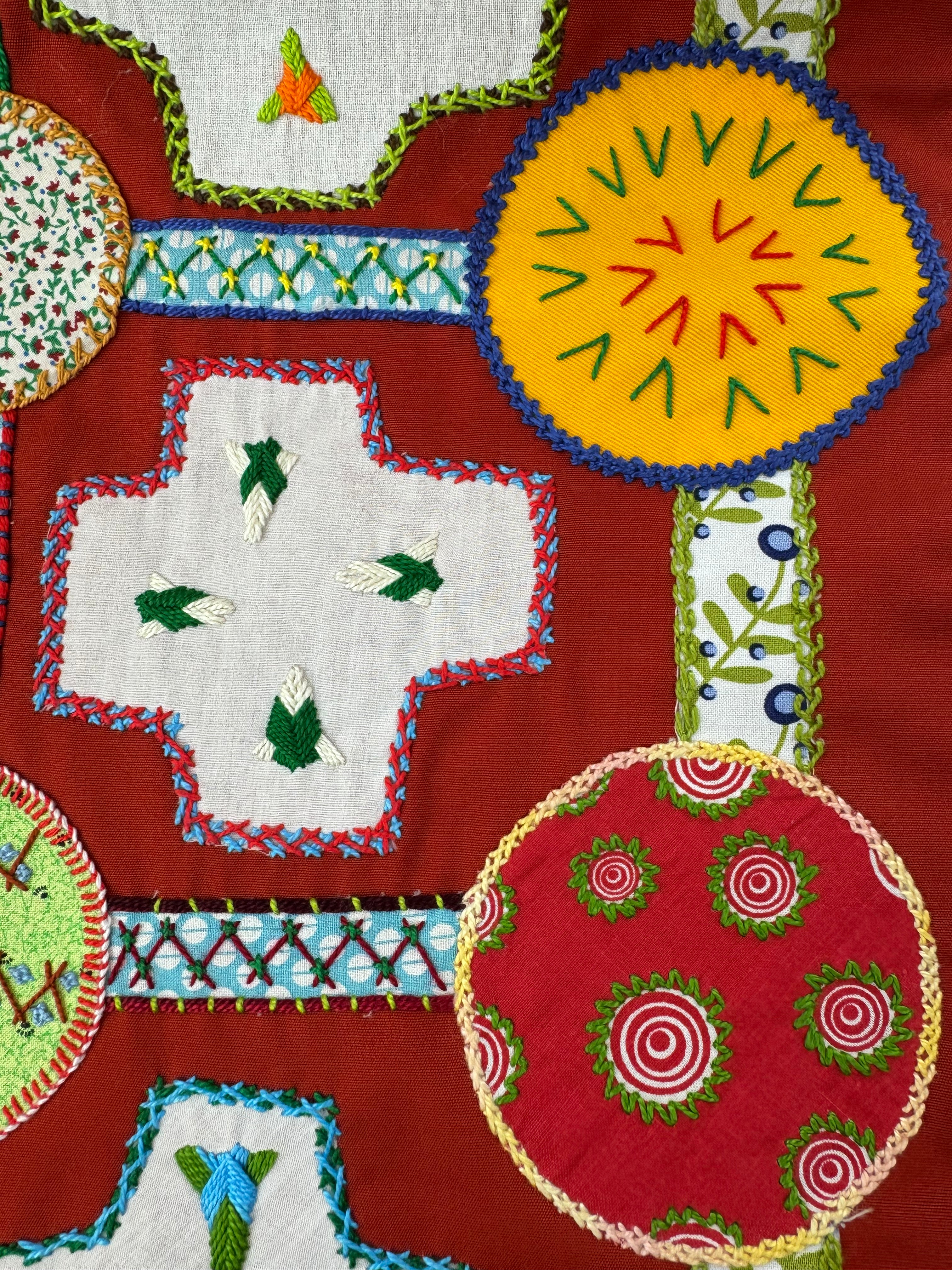 Cruces design table runner embroidered on rust Honduras Threads