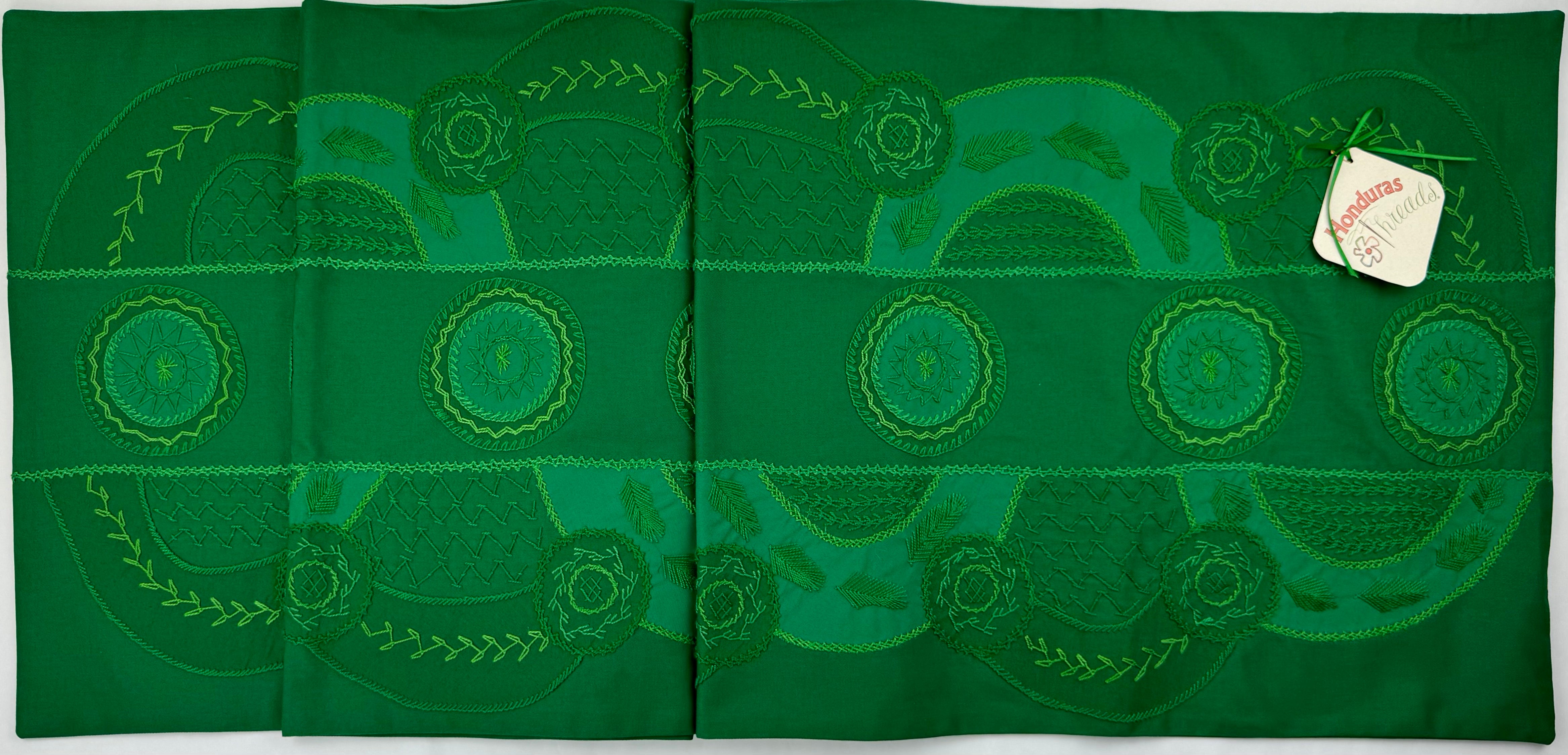 El doce Design Embroidered Table Runner on Green Honduras Threads