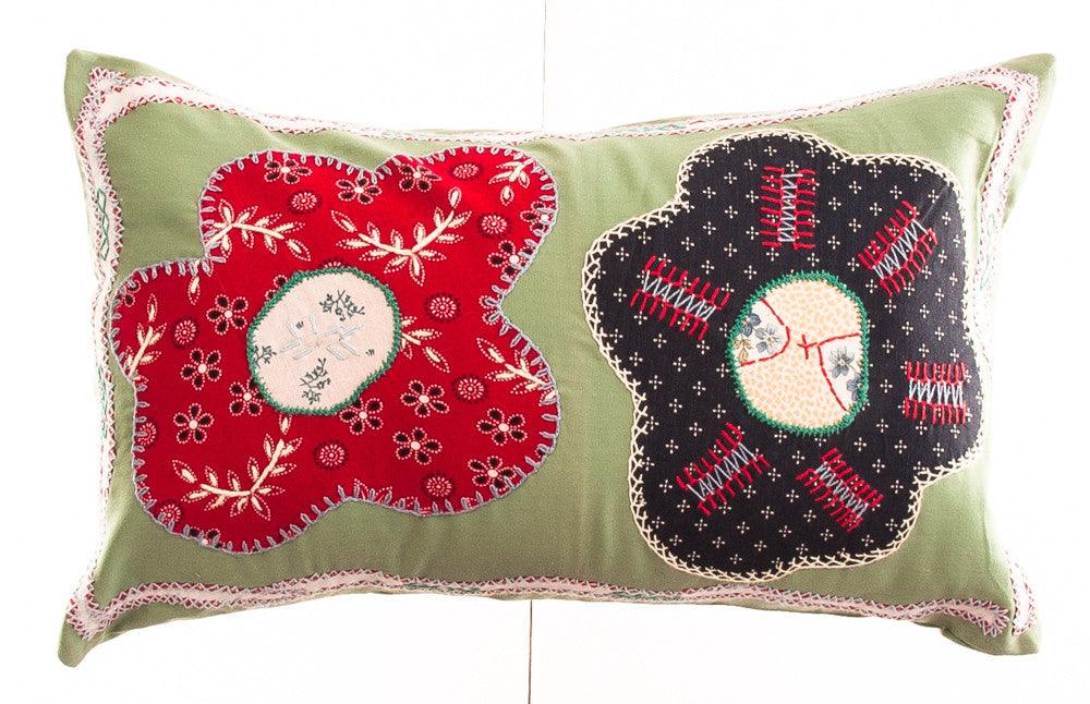 Dos Flores Design Embroidered Pillow on light green Honduras Threads