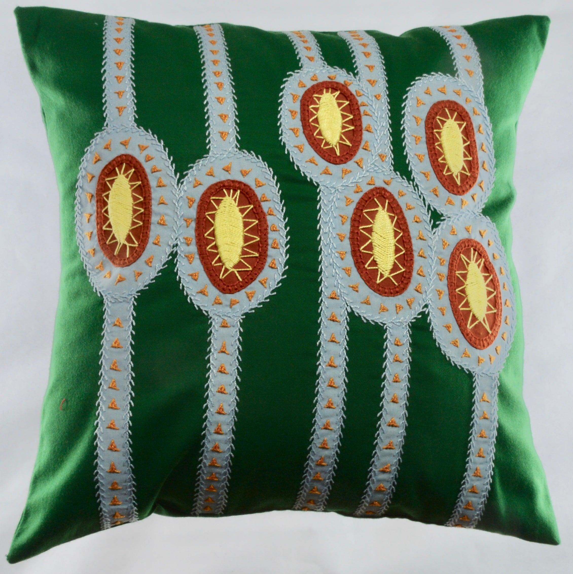 Maracas Design Embroidered Pillow on green Honduras Threads