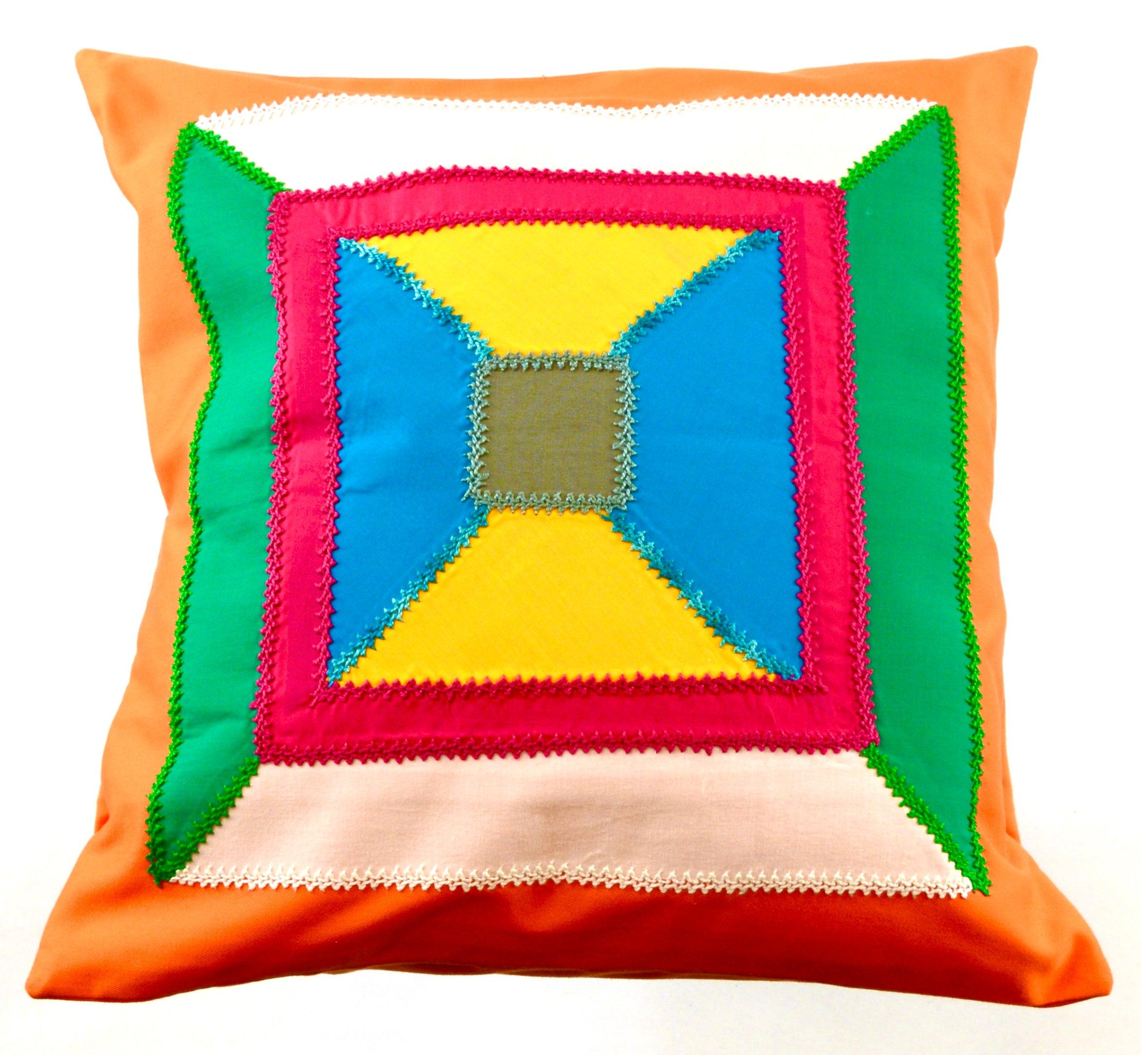 De Colores Design Embroidered Pillow on orange Honduras Threads