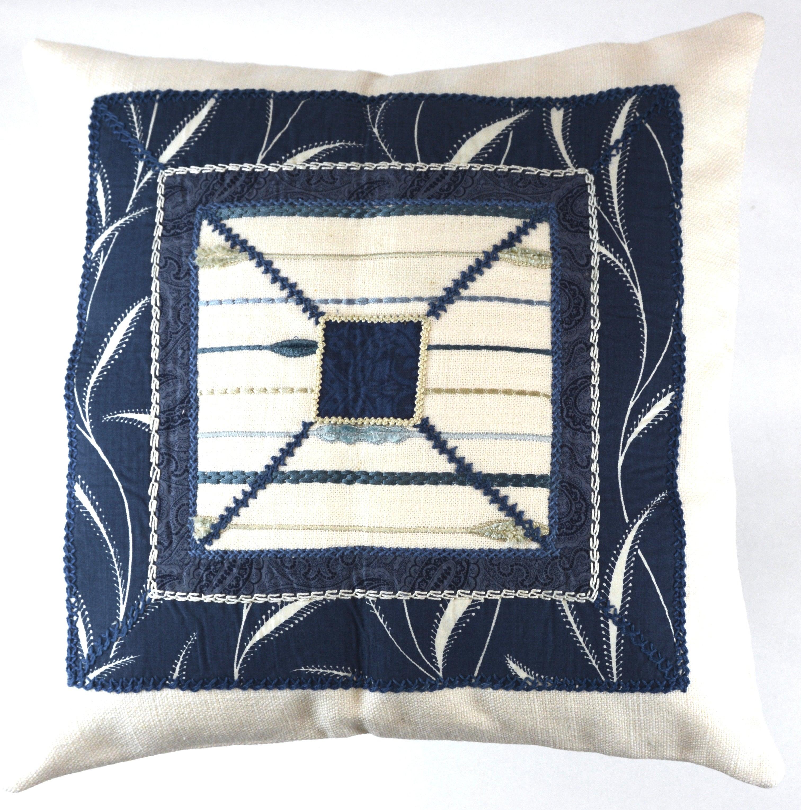 De Colores Design Embroidered Pillow on white Honduras Threads
