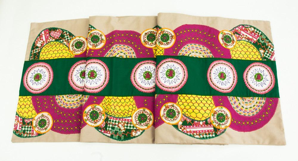 El Doce Design Embroidered Table Runner on khaki Honduras Threads