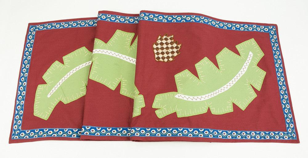 Hojas Design Embroidered Table Runner on red Honduras Threads