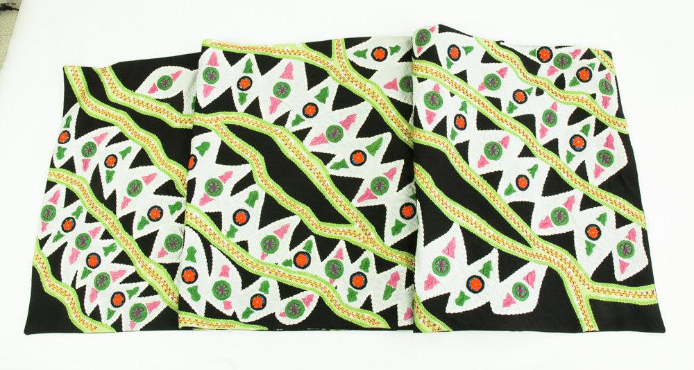 Hojas en el Rio Design Embroidered Table Runner on black Honduras Threads