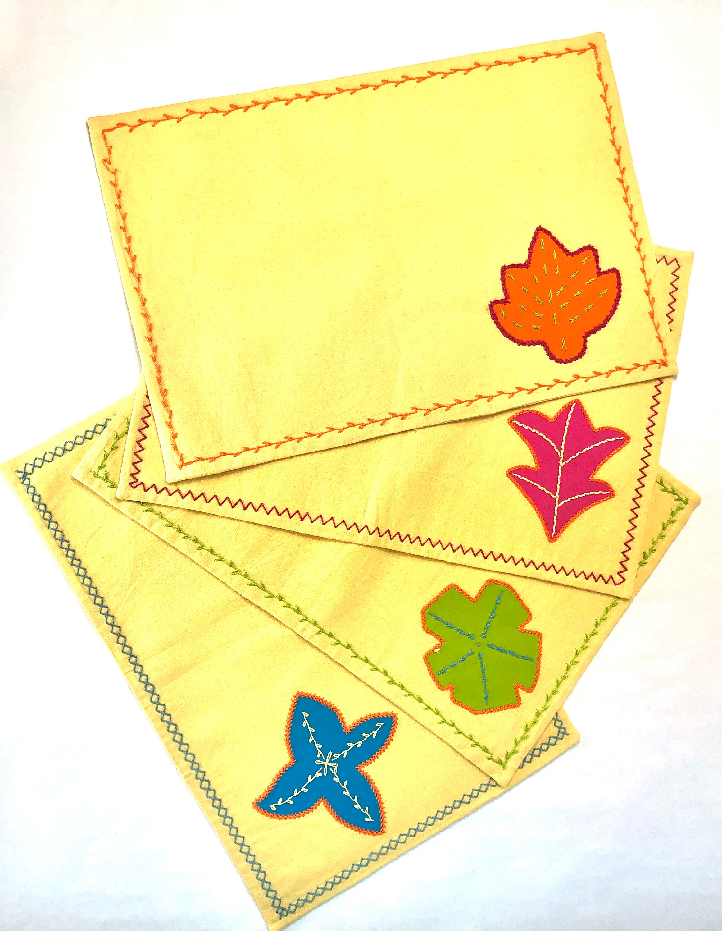 Flores Placemats on Yellow Honduras Threads