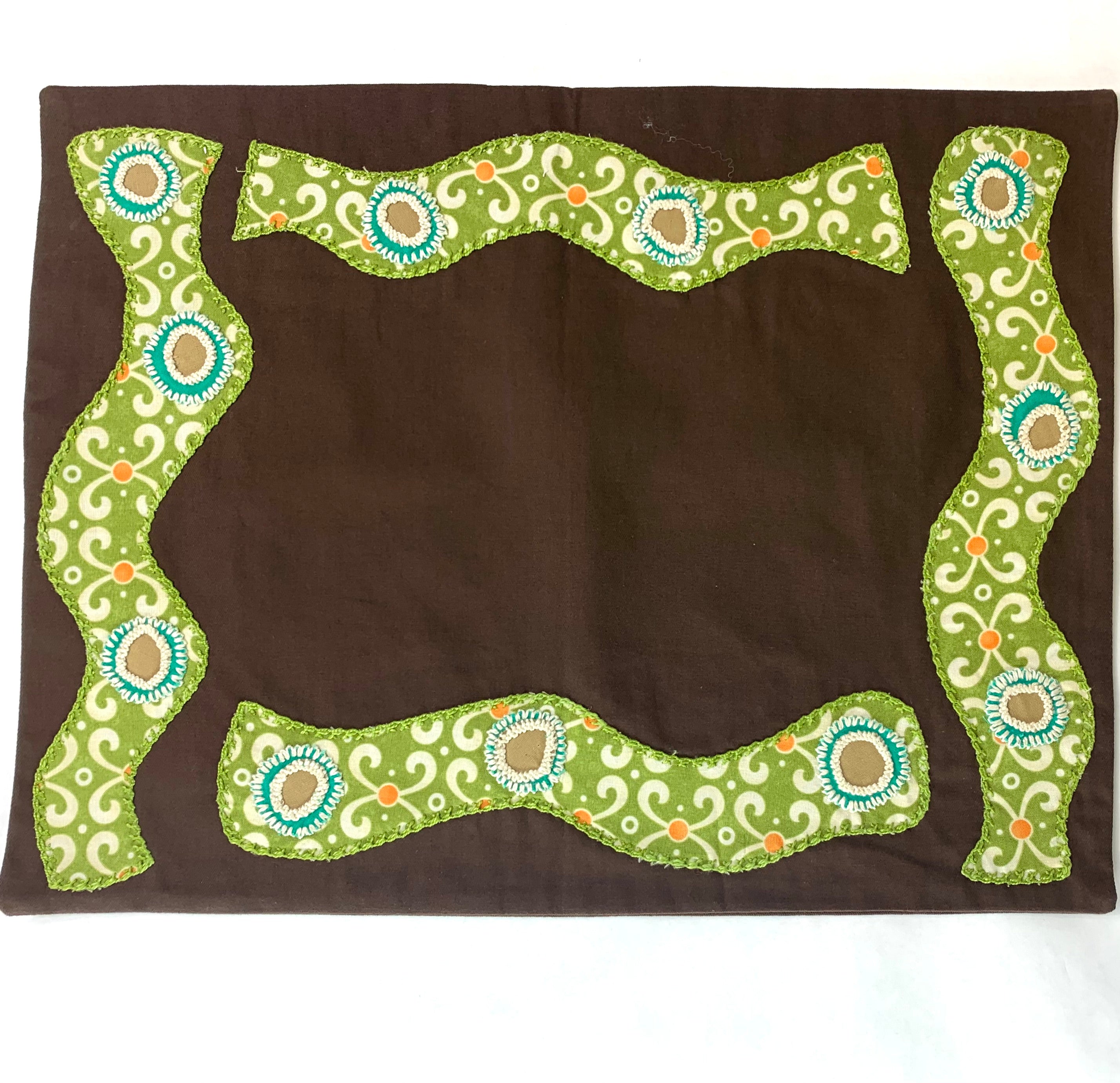 Olas Placemats on Brown Honduras Threads