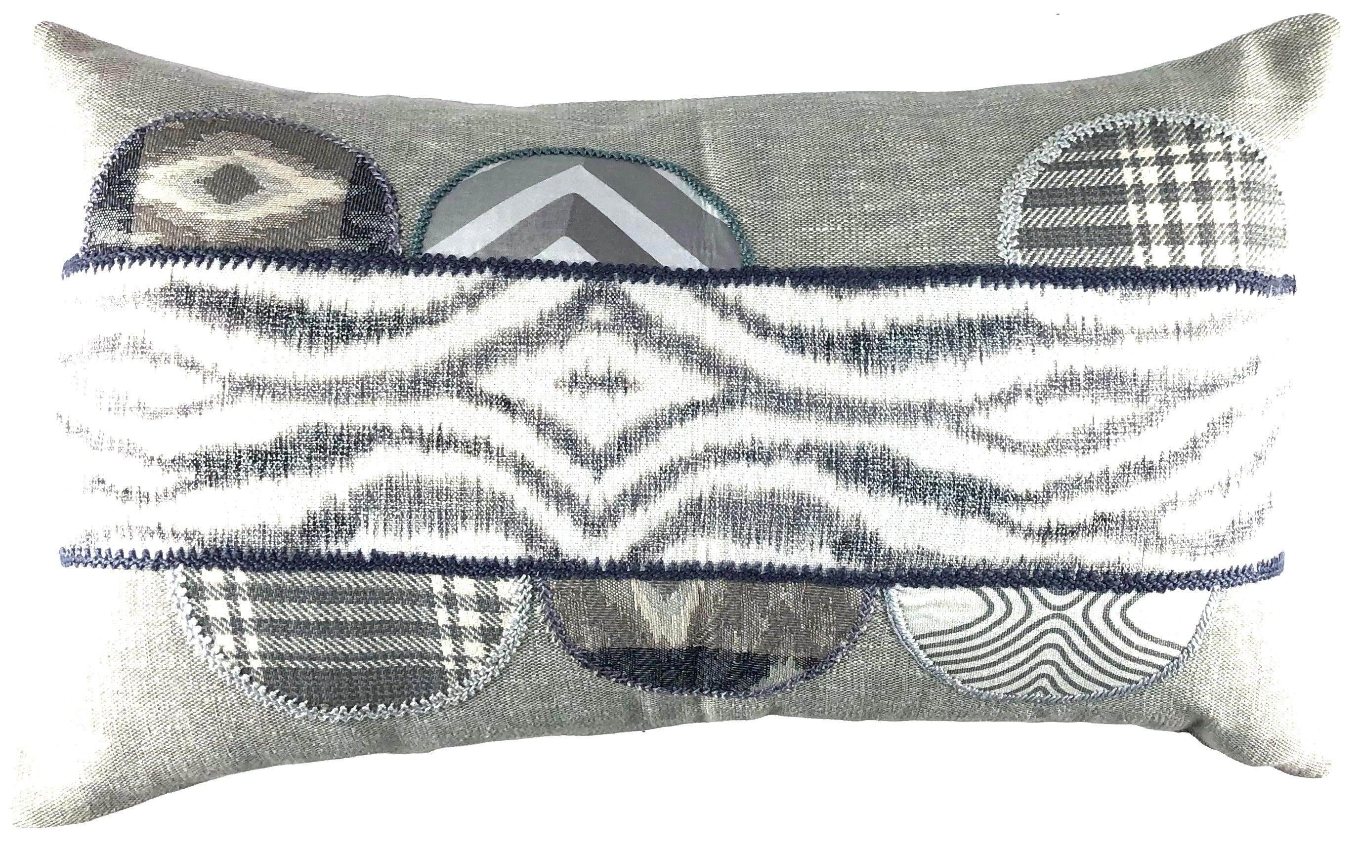 Piedras Lunar Design Embroidered Pillow on gray