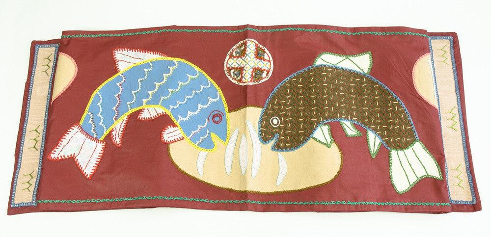 Pan y Pescado Design Embroidered Table Runner on Red Honduras Threads