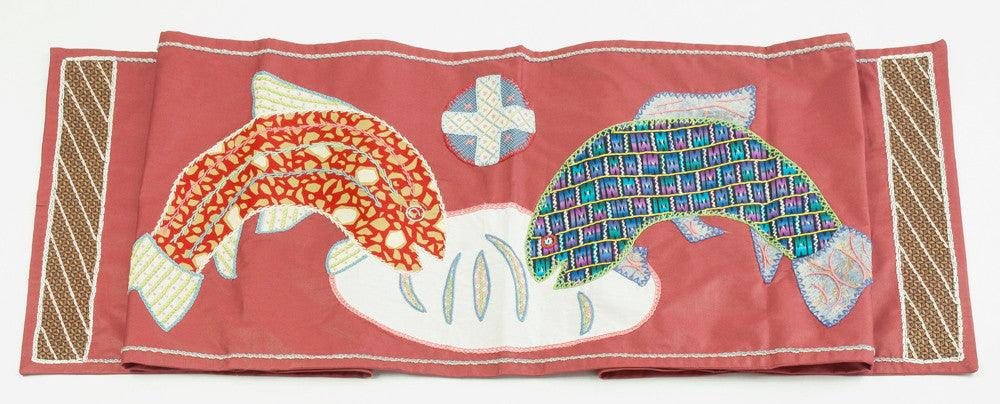 Pan y Pescado Design Embroidered Table Runner on Red Honduras Threads