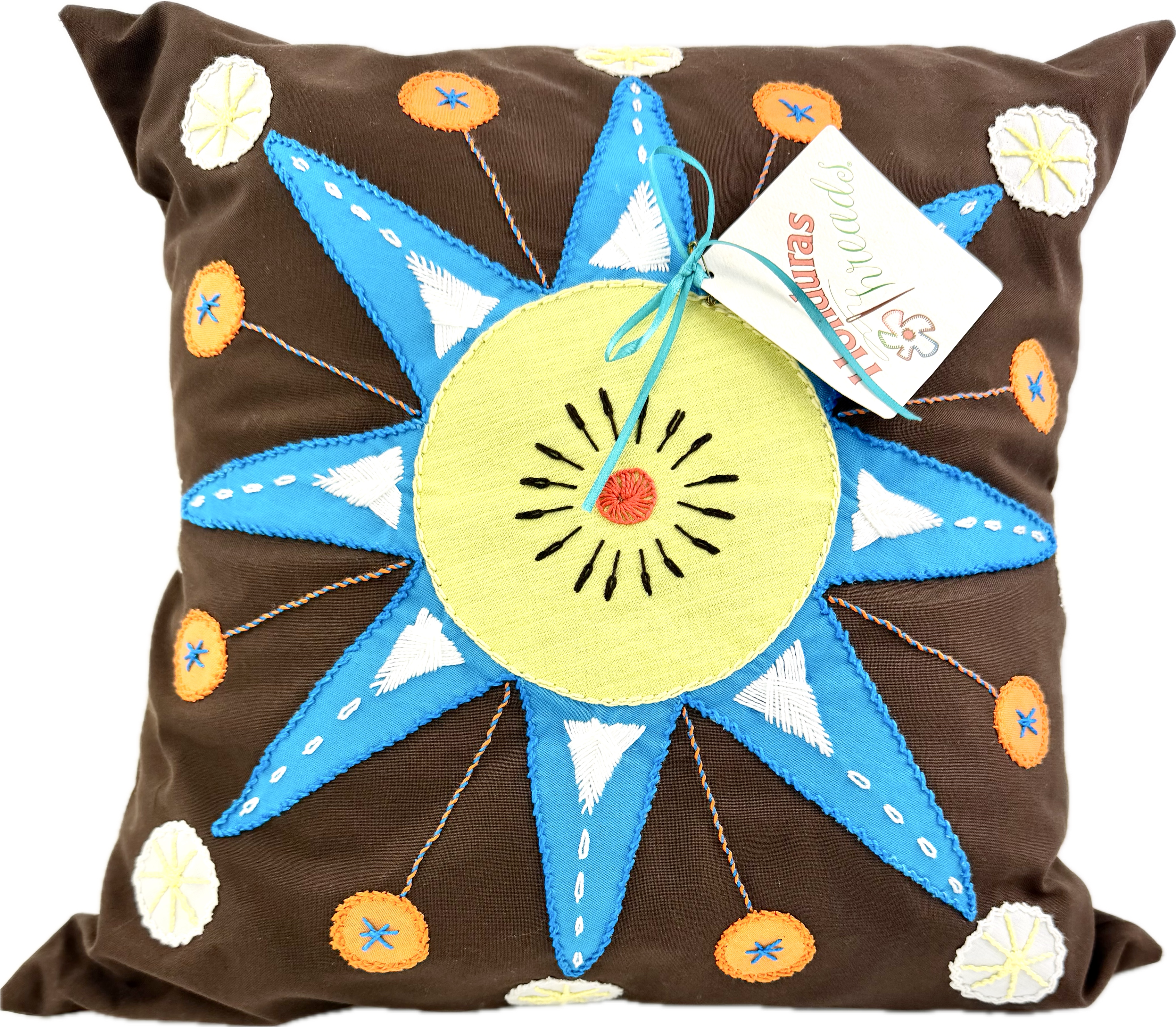Sol Azul Design by Pamela Nelson. Hand Embroidered Pillow on dark brown Pamela Nelson