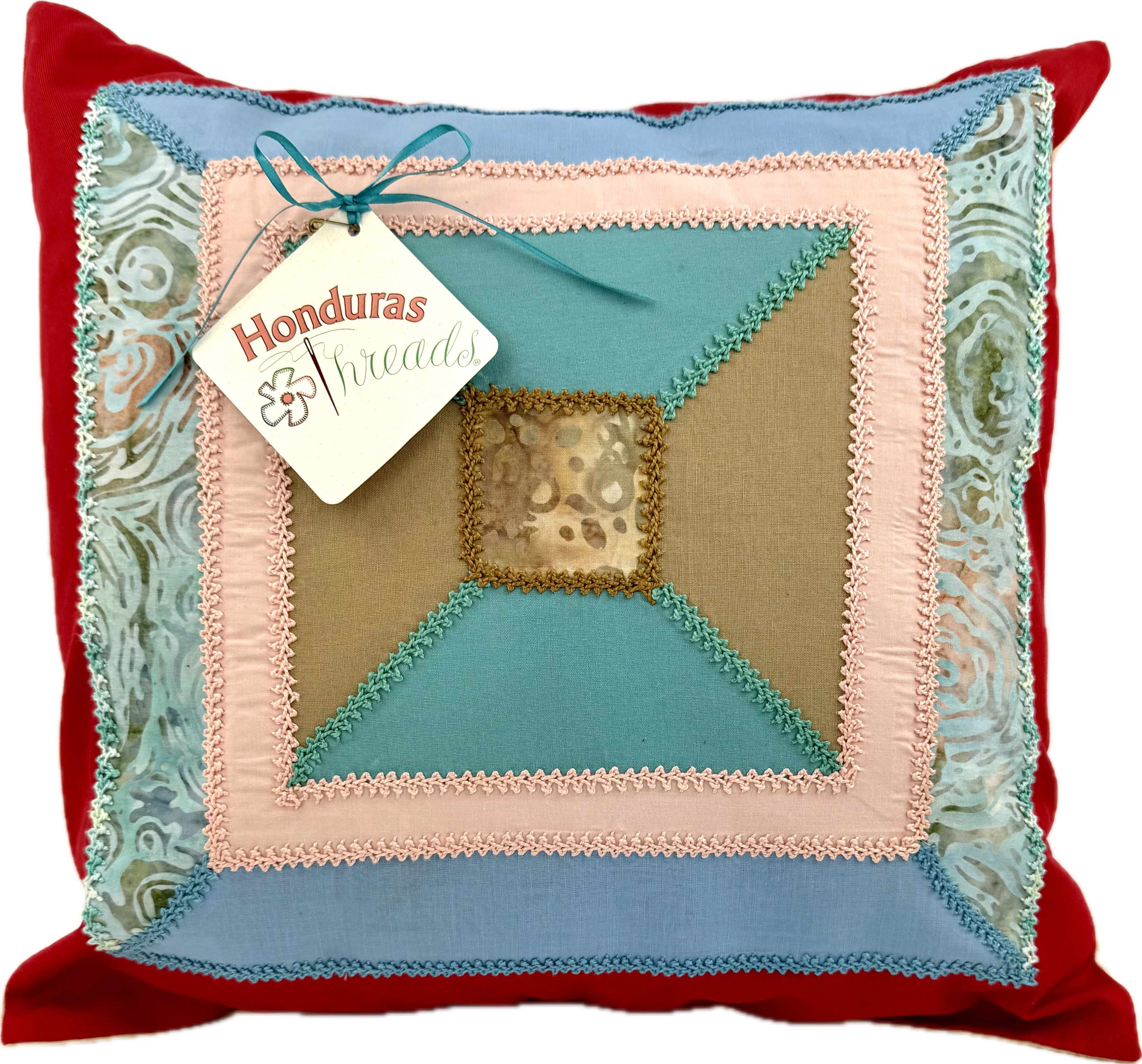 De Colores Design by Pamela Nelson.  Hand Embroidered Pillow on red Pamela Nelson