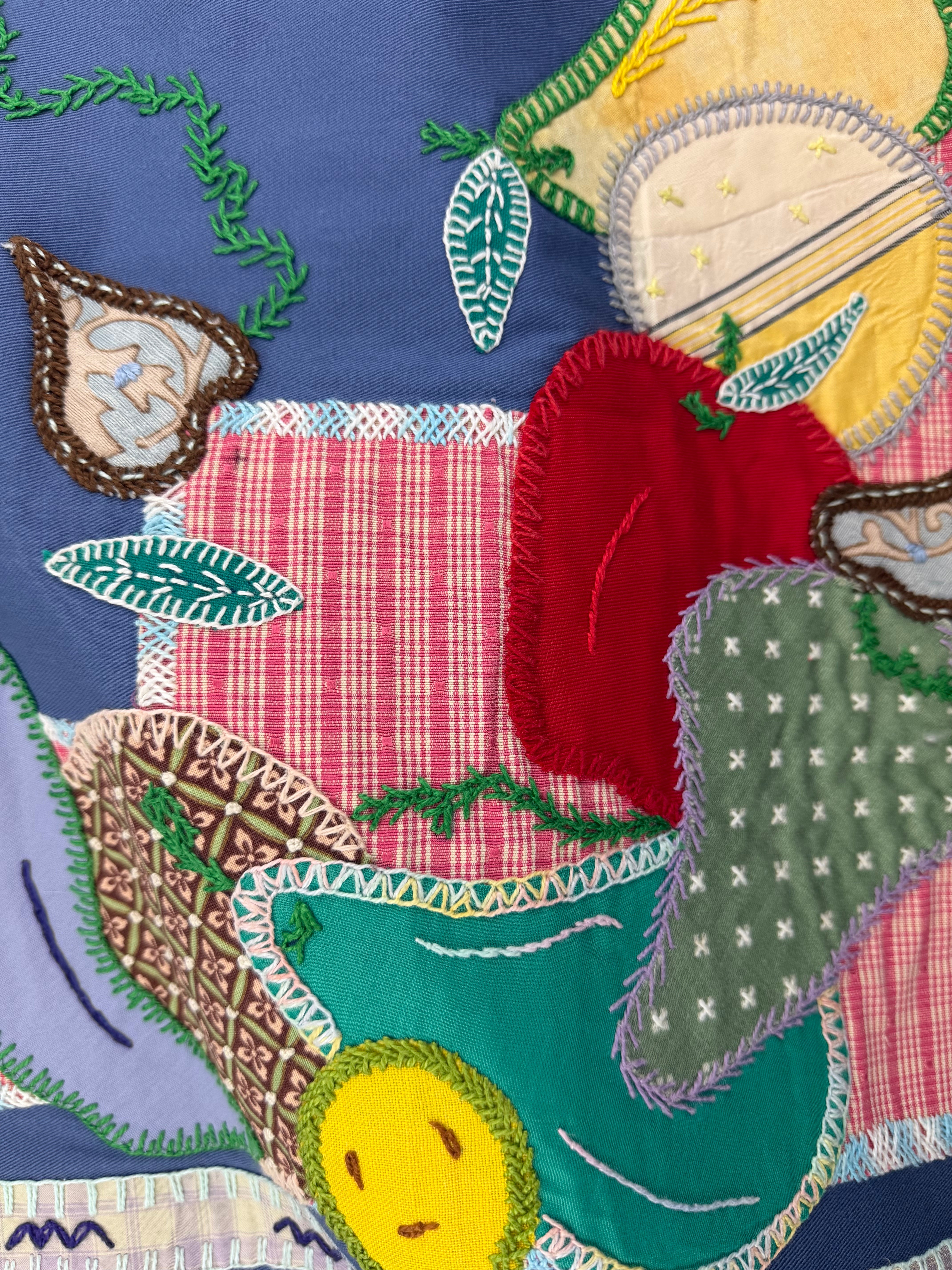 Fruitas Design by Barbara Velhum.  Hand Embroidered on blue. Barbara Velhum