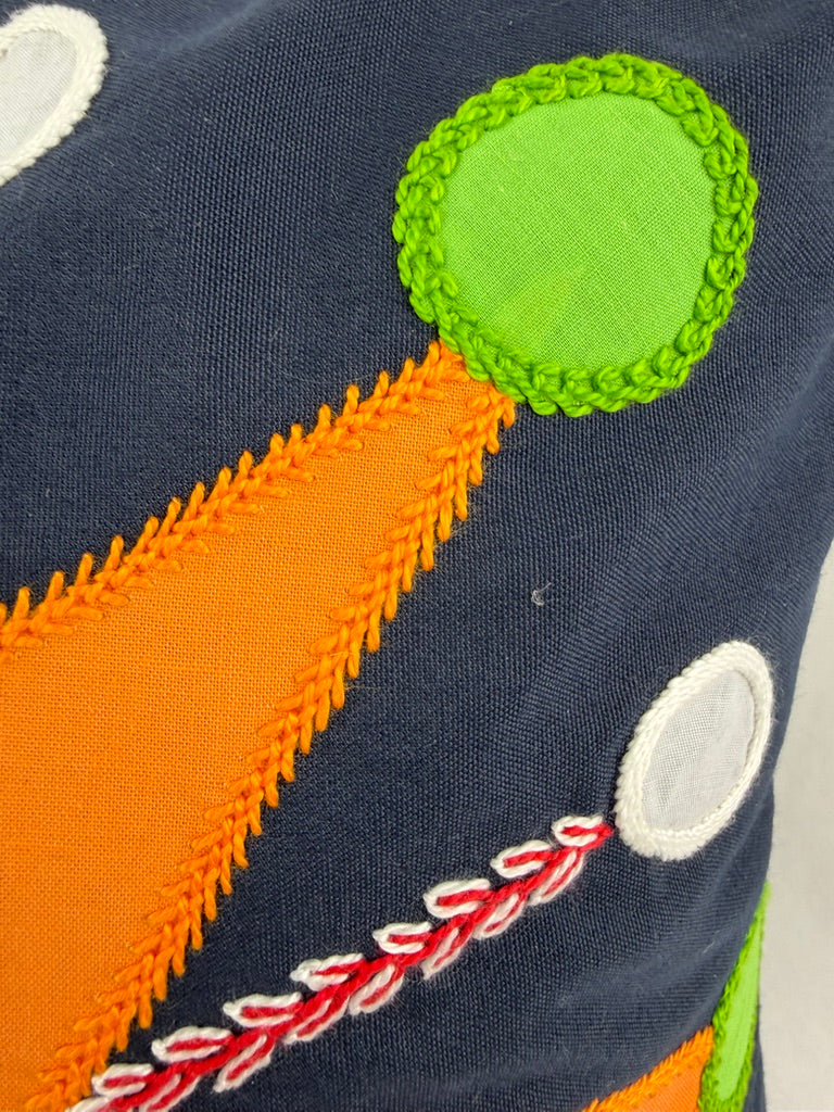 Sol Azul Design by Pamela Nelson. Hand Embroidered Pillow on navy blue Pamela Nelson