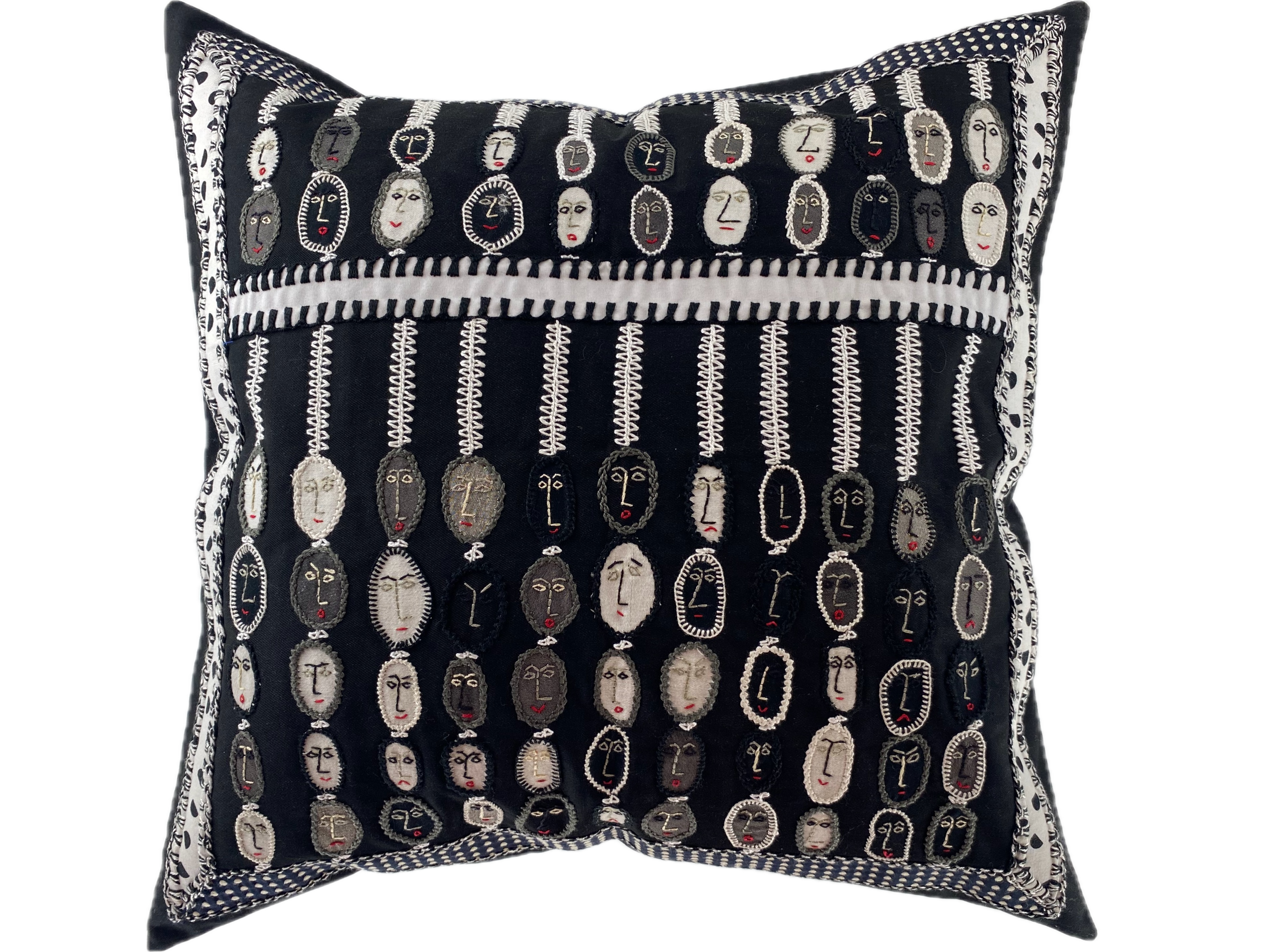 Abacus Design by Barbara Glazer Rosenblatt.  Embroidered pillow on black Honduras Threads
