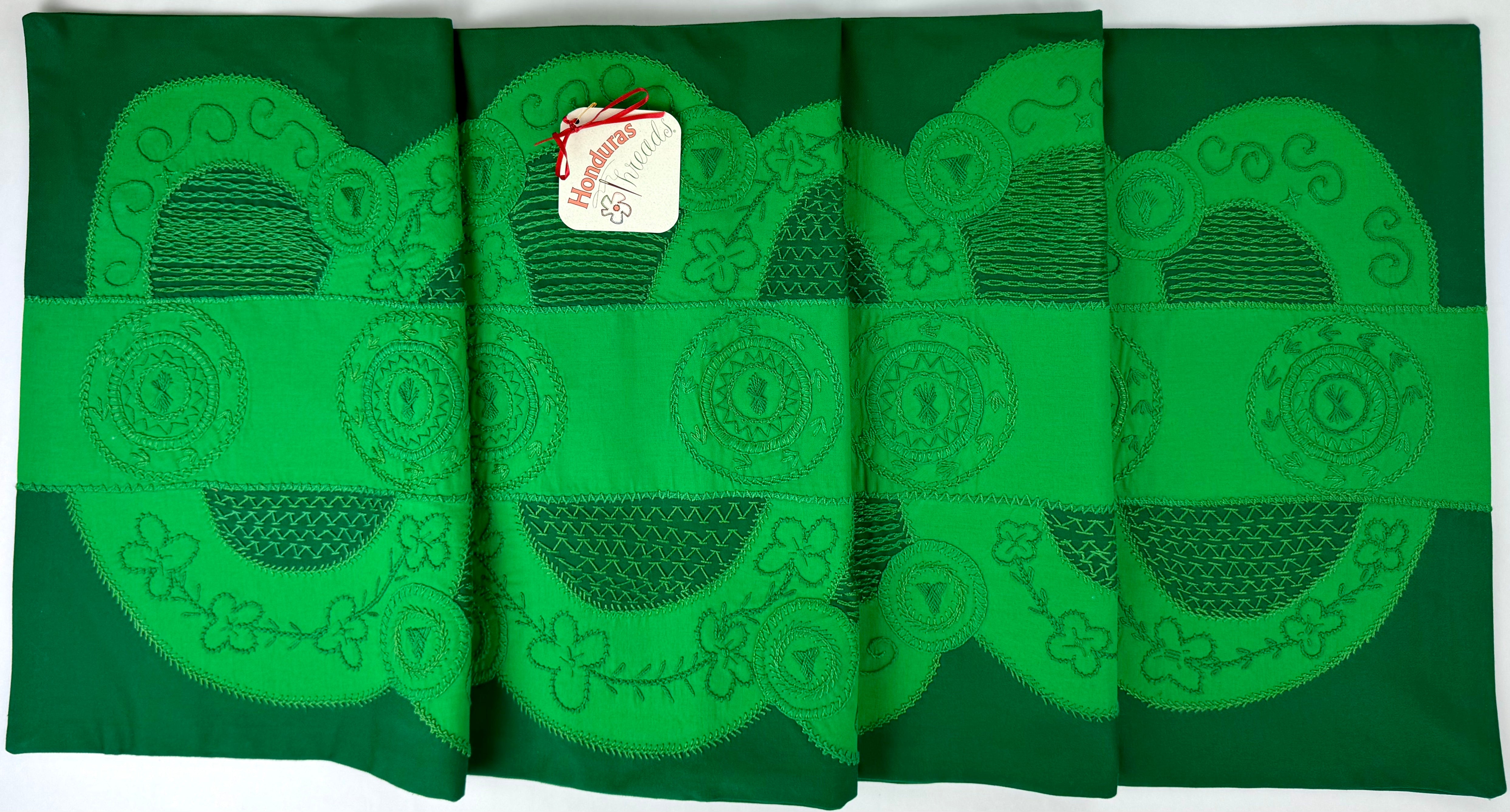 El doce Design Embroidered Table Runner on Green Honduras Threads