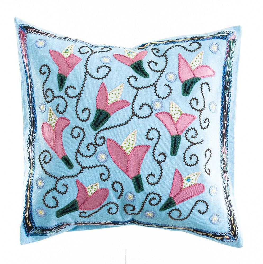 Lirios Design Embroidered Pillow on light blue Honduras Threads