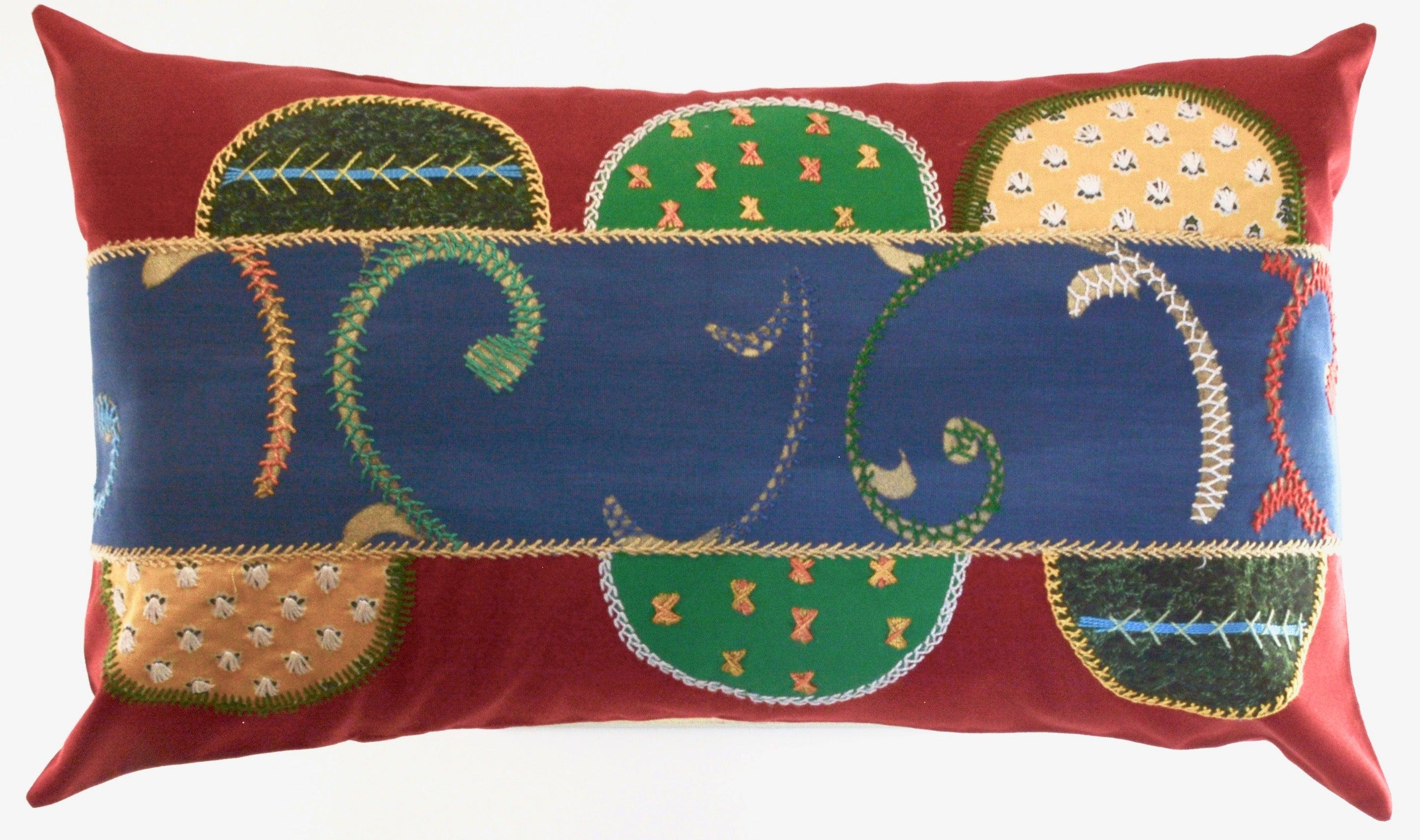 Piedras Lunar Design Embroidered Pillow on red Honduras Threads