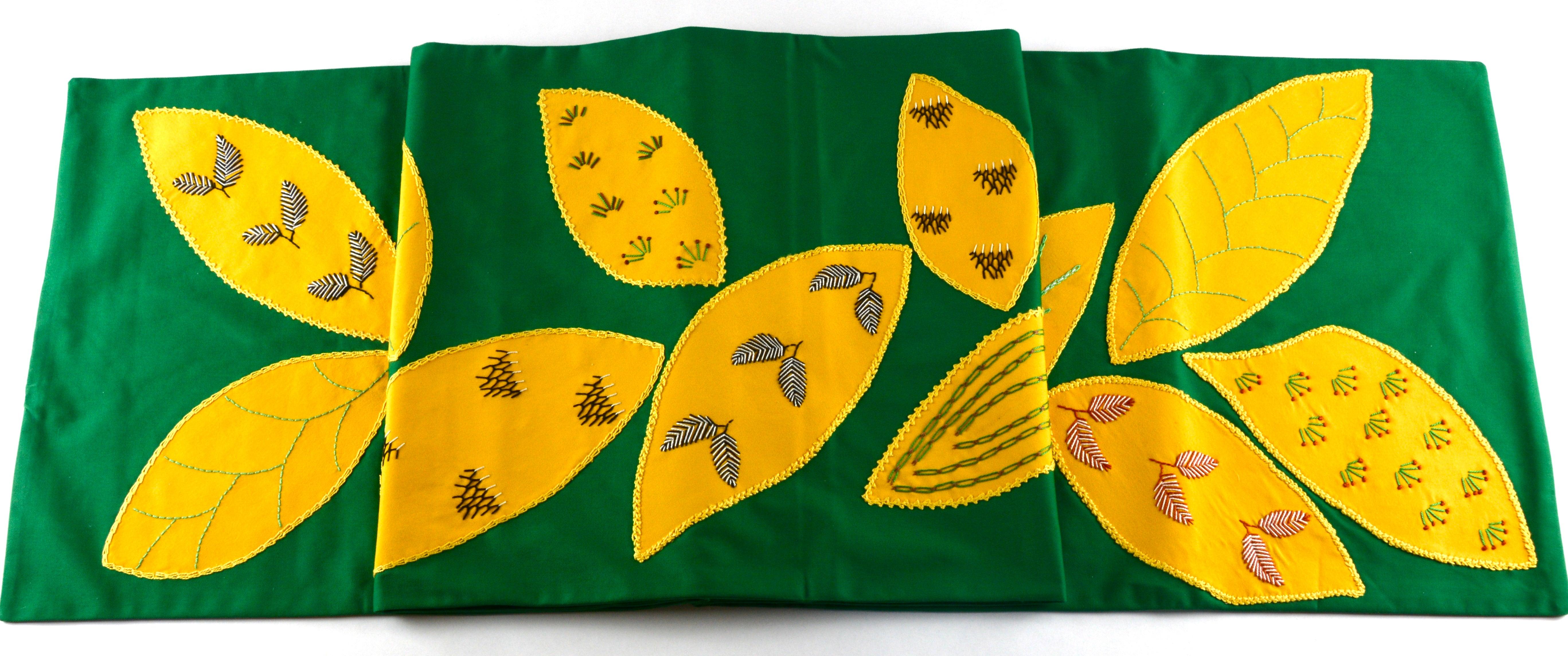 Huellas Design Embroidered Table Runner on Green Honduras Threads