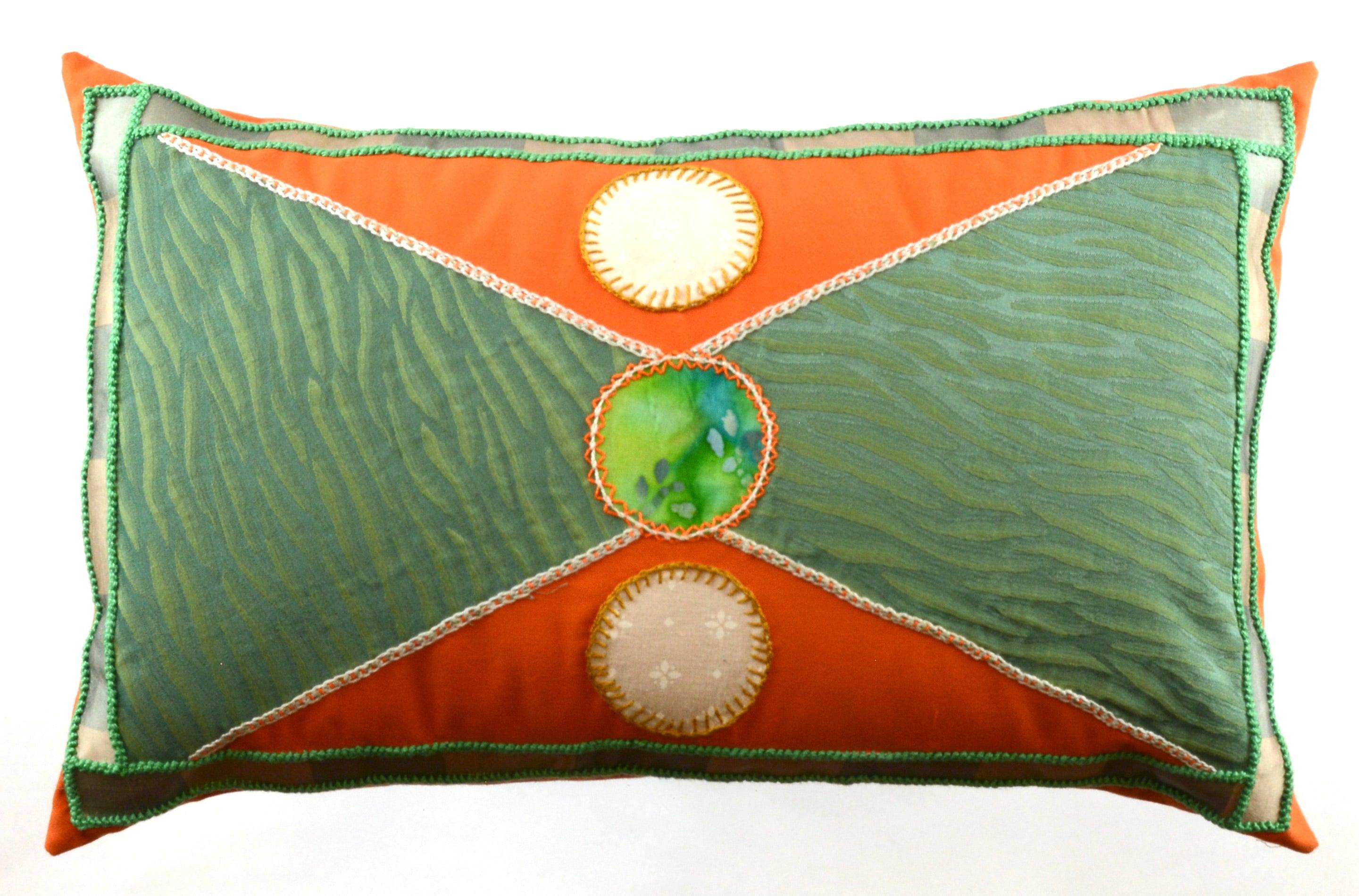 Corbatín Design Embroidered Pillow on orange Honduras Threads
