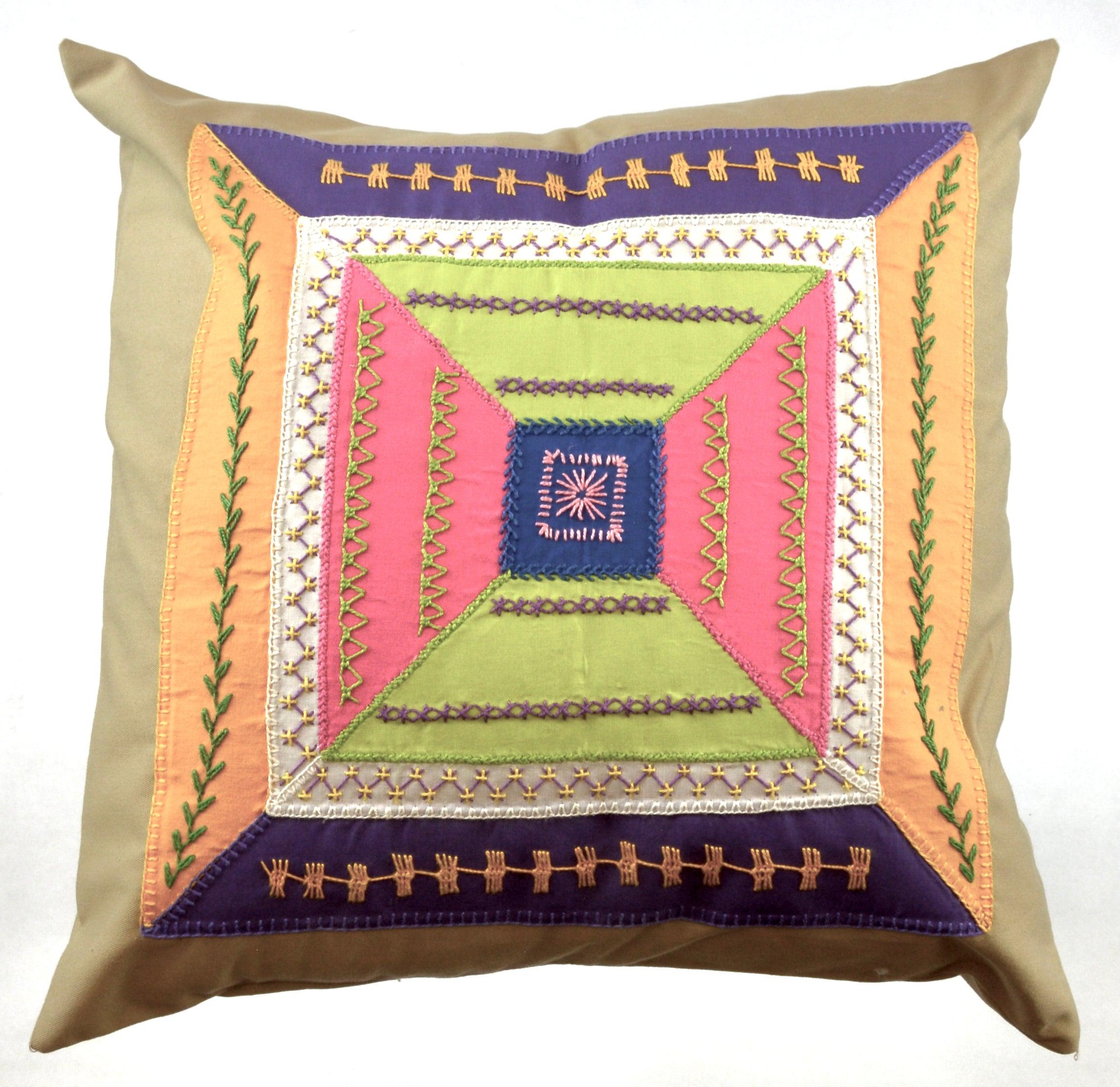 De Colores Design Embroidered Pillow on caramel Honduras Threads