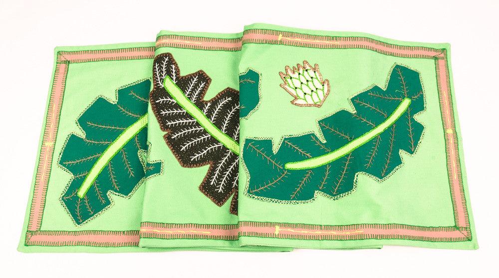 Hojas Design Embroidered Table Runner on light green Honduras Threads