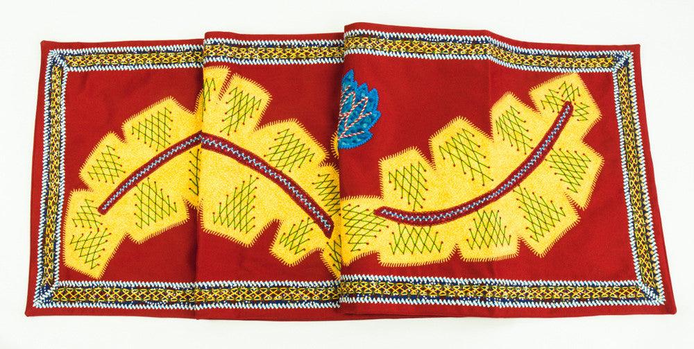 Hojas Design Embroidered Table Runner on red Honduras Threads