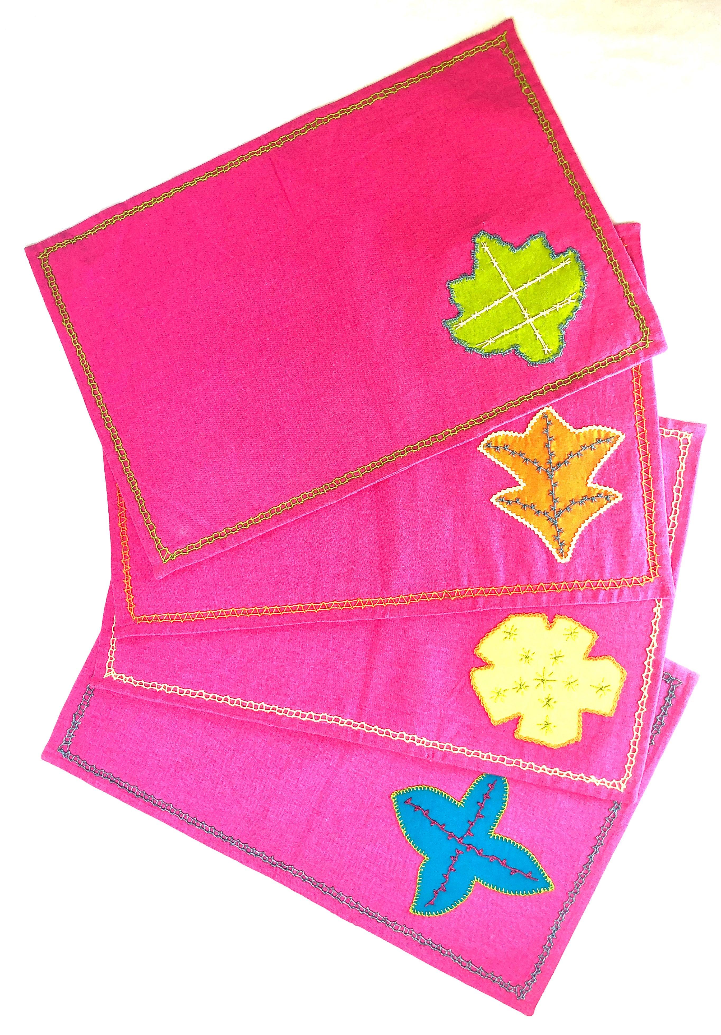 Flores Placemats on Pink Honduras Threads