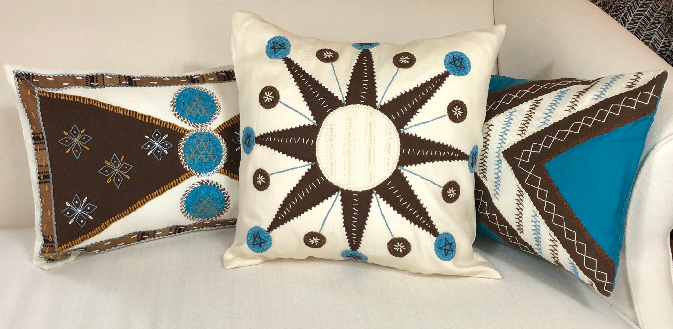 Corbatín Design Embroidered Pillow on white Honduras Threads