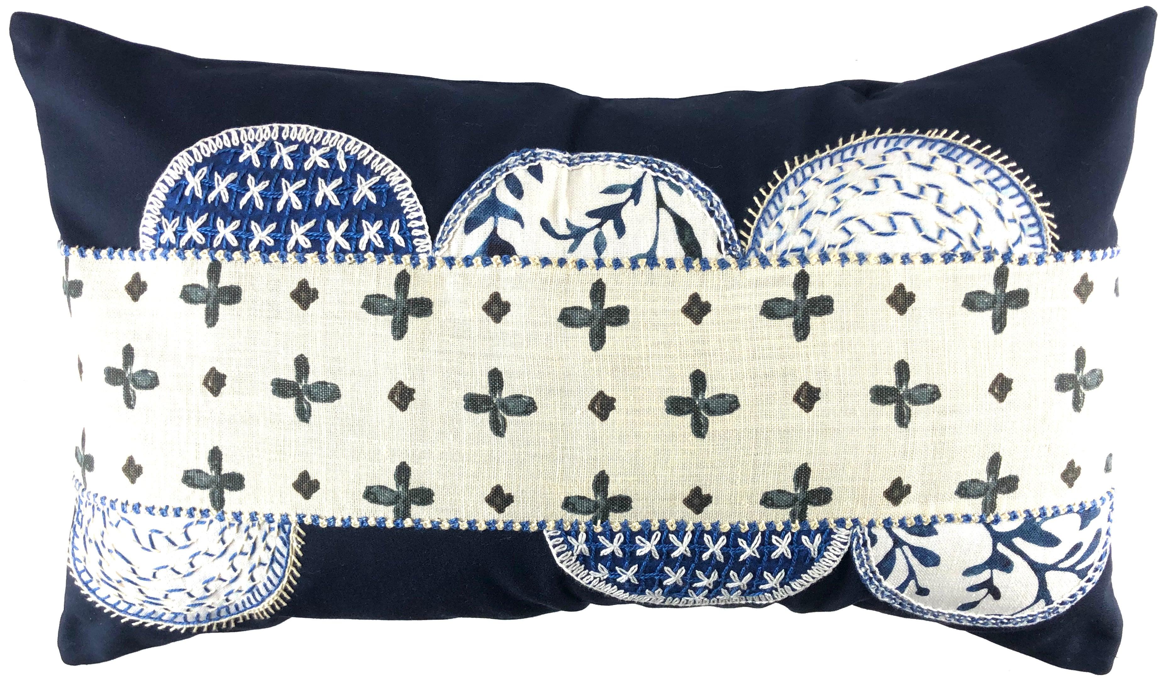 Piedras Lunar Design Embroidered Pillow on navy Honduras Threads