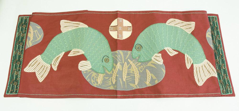 Pan y Pescado Design Embroidered Table Runner on red Honduras Threads